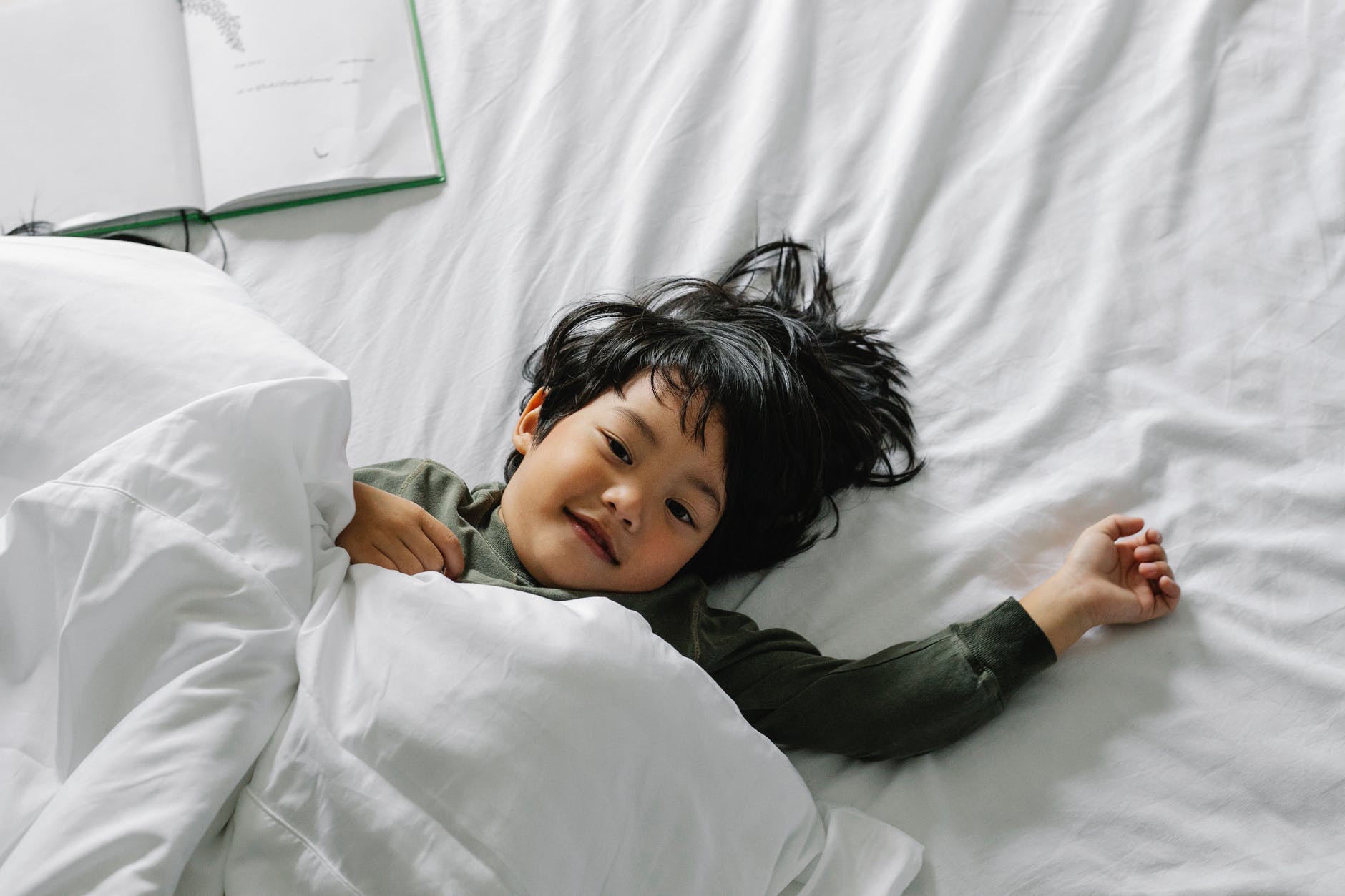 Child lying in bed
