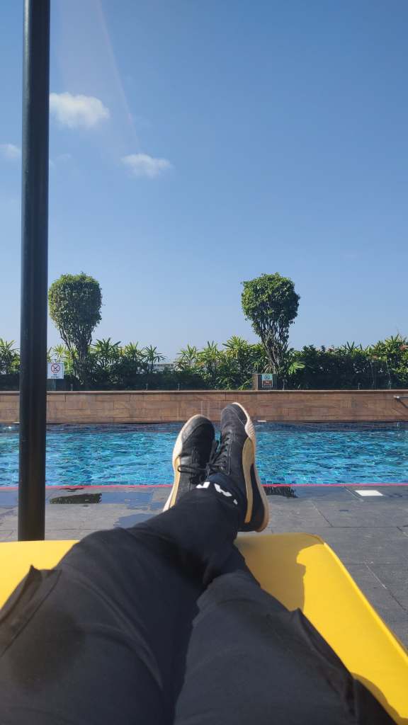 Puma Mesh Sneaker near the pool