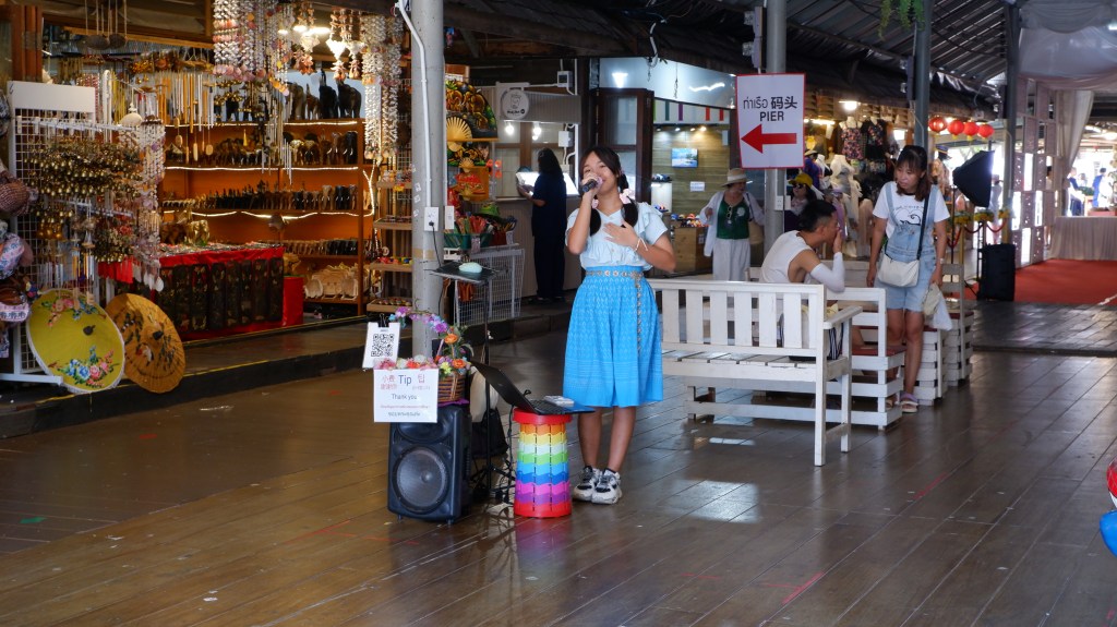 Girl singing in Thailand